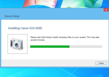 How do I download pictures from my Nikon camera to my phone?