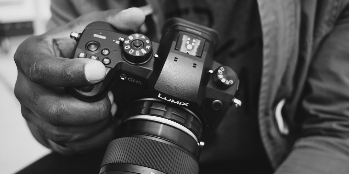 How do I focus my Panasonic camera?