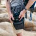 How do you carry a camera while hiking?