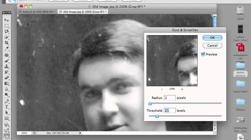 How do you remove dust from old photos?