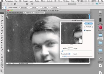 How do you remove dust from old photos?