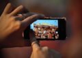 How do you take a picture in Pano mode?