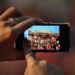 How do you take a picture in Pano mode?