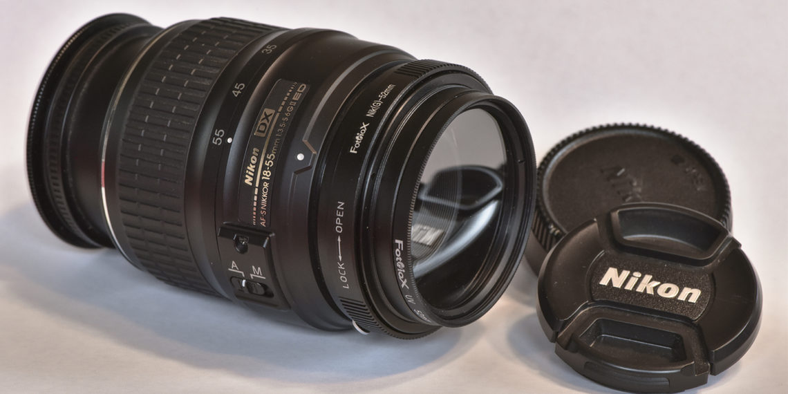 How far does an 18-55mm lens zoom?