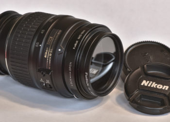 How far does an 18-55mm lens zoom?