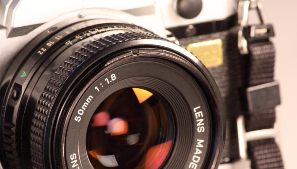 What are the two types of camera shutters?