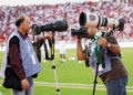 What lens do sports photographers use?