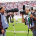What lens do sports photographers use?