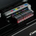 What type of ink does Canon Pro 100 use?