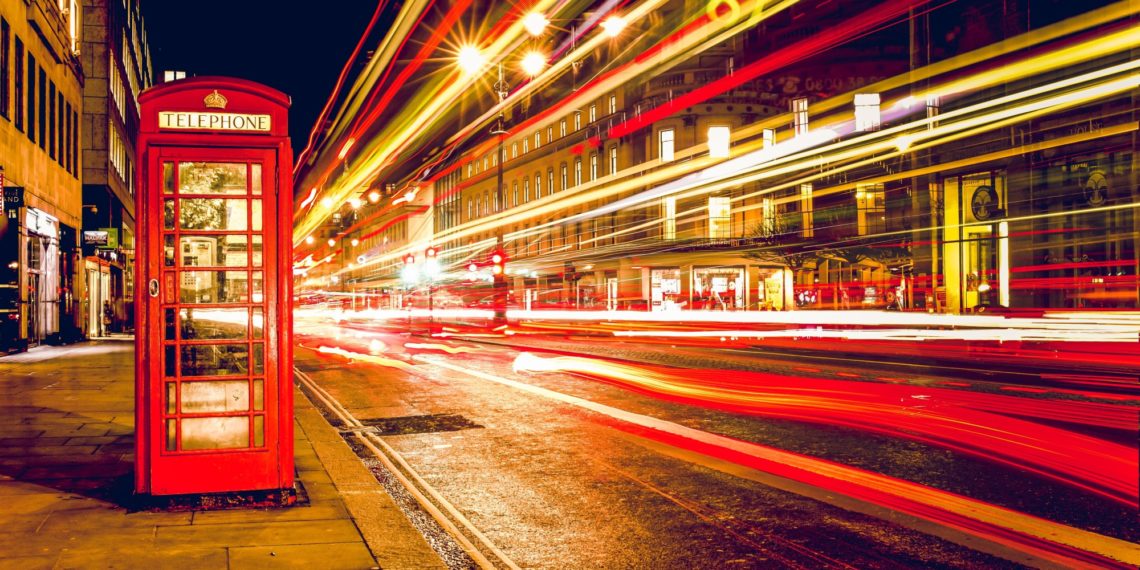 Why do photographers blur the background?